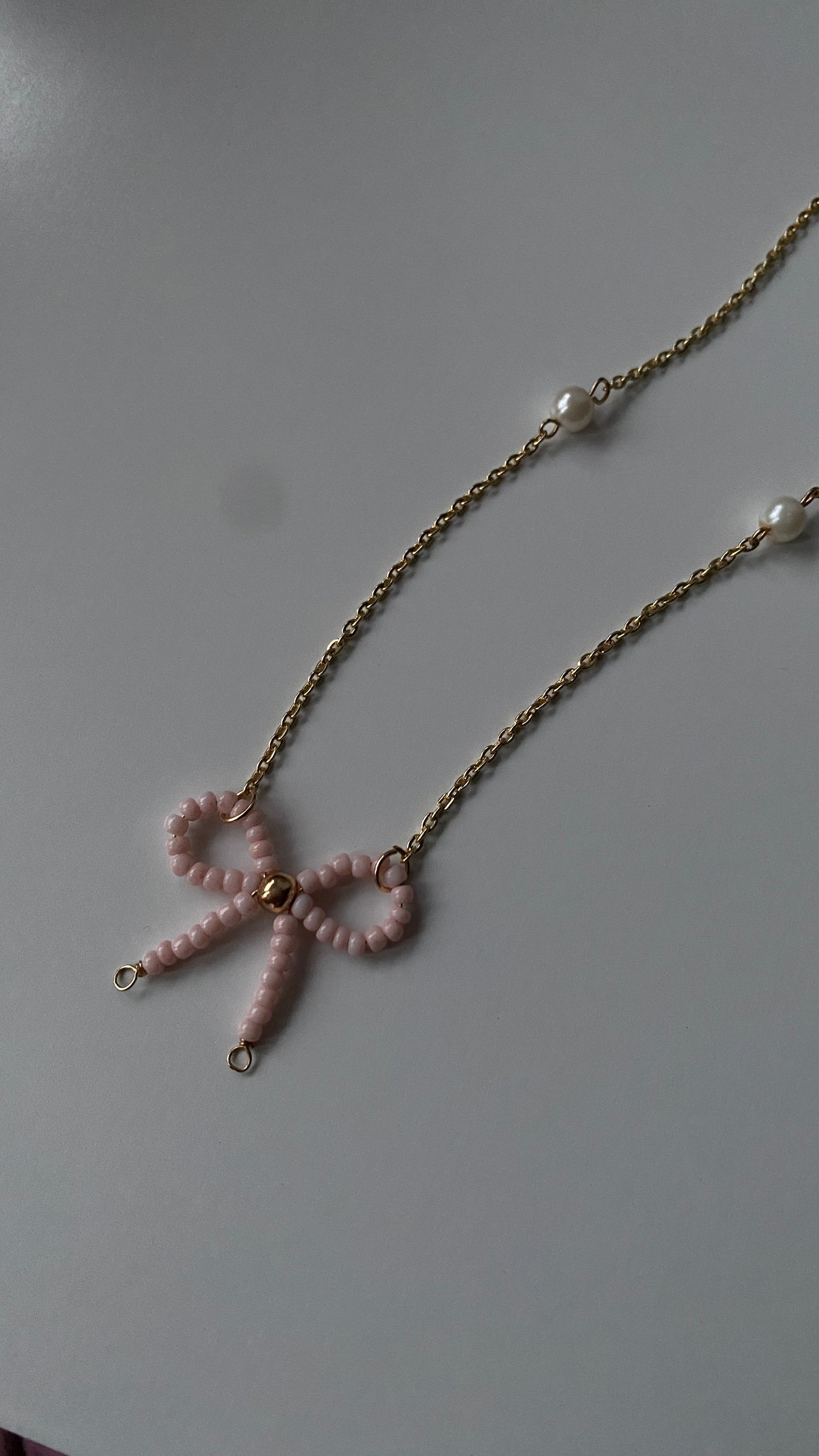 Beaded bow pink necklace ๐